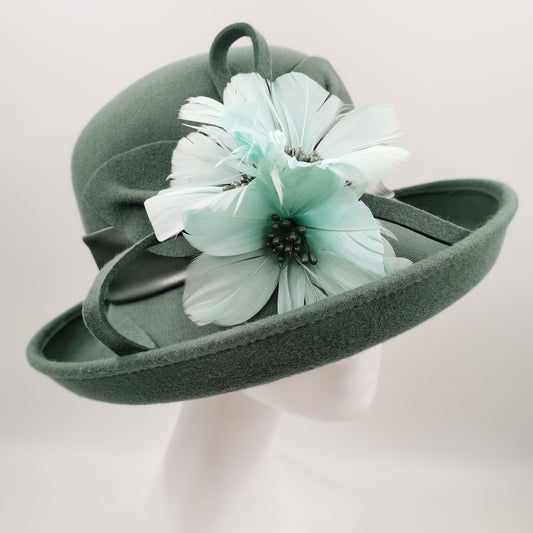 Stunning  olive wool hat with teal embelishment