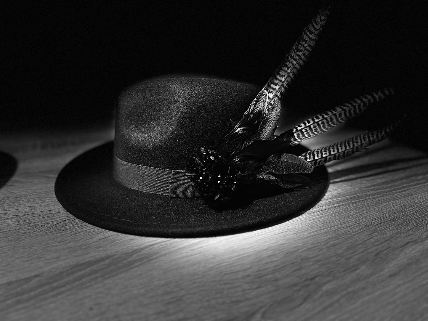 Navy hat with large Feather Trim