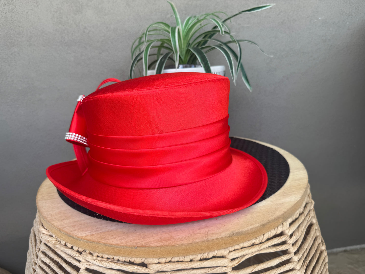 Beautiful red satin overlay hat with loops and bling