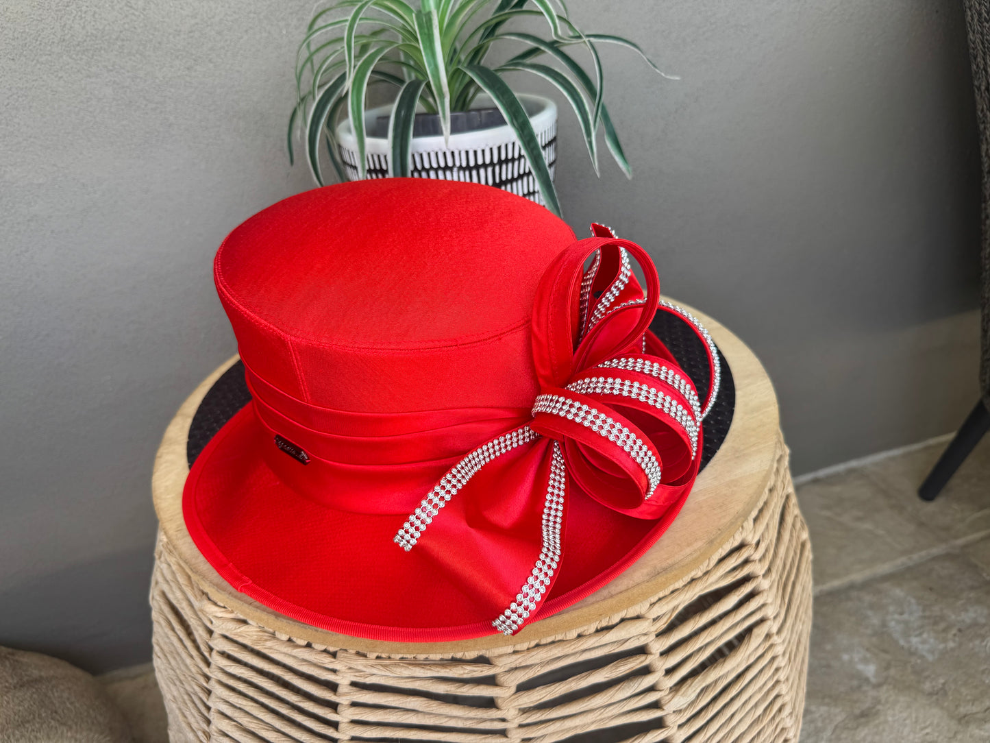 Beautiful red satin overlay hat with loops and bling