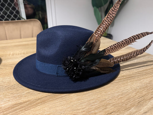 Navy hat with large Feather Trim