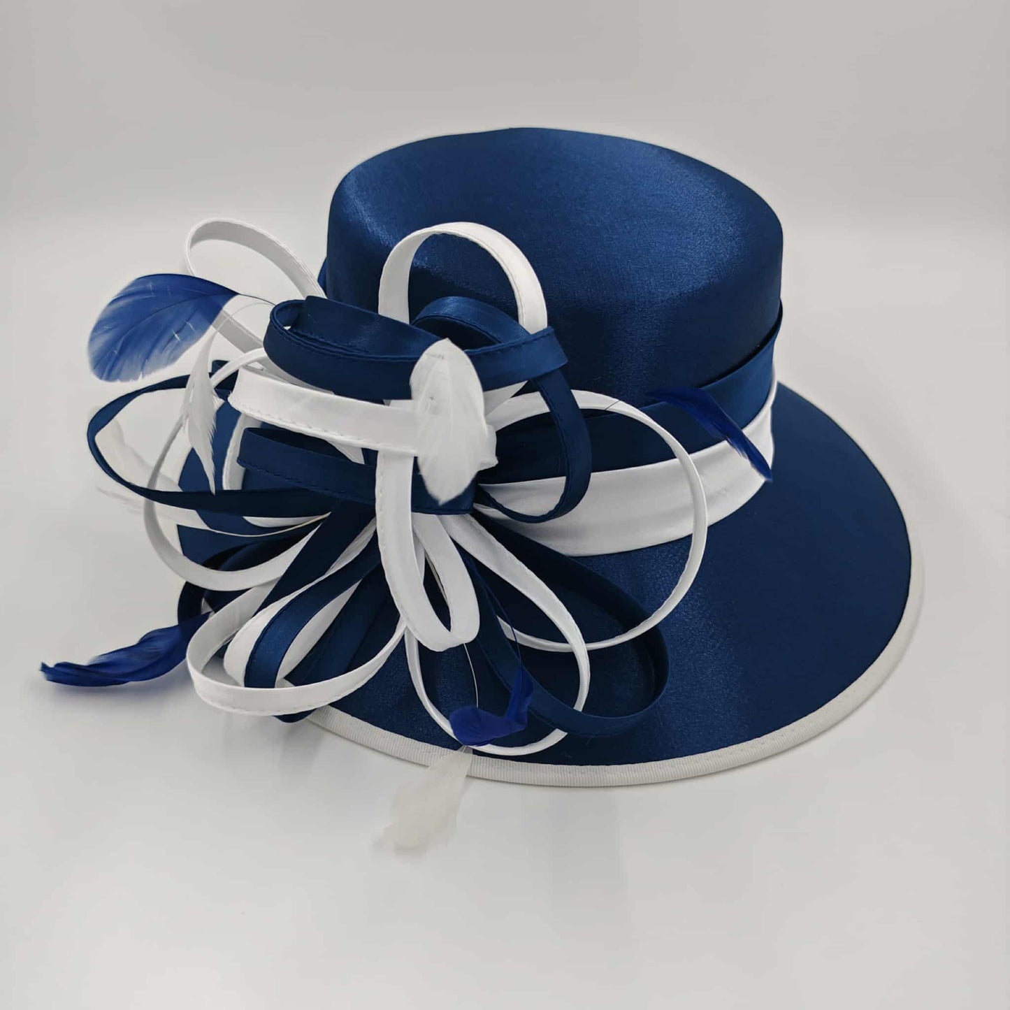 Stunning navy sinamay with white trim