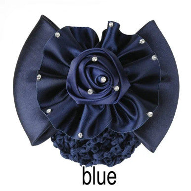 Navy hairpiece on clip with bling