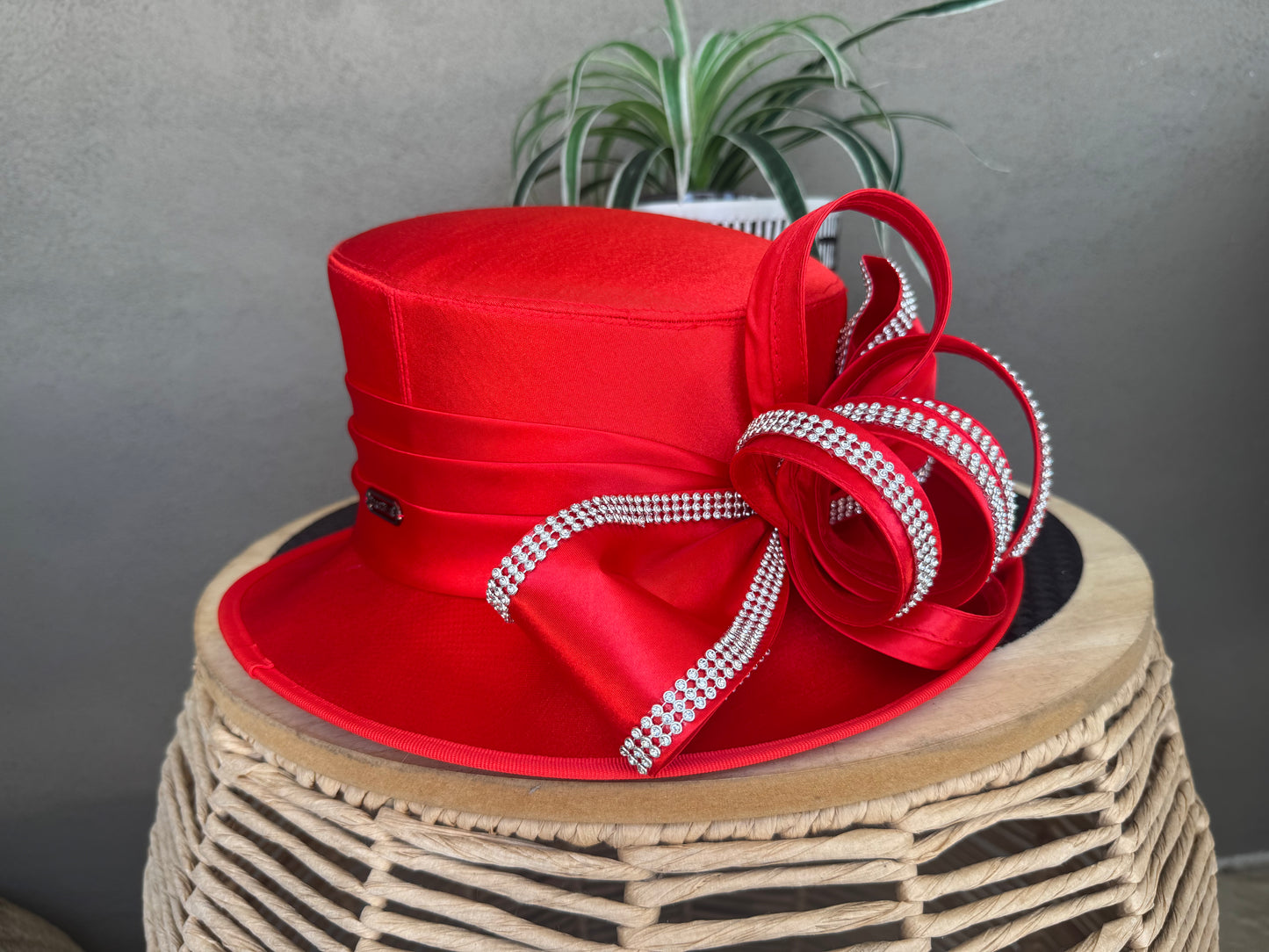 Beautiful red satin overlay hat  with loops and bling