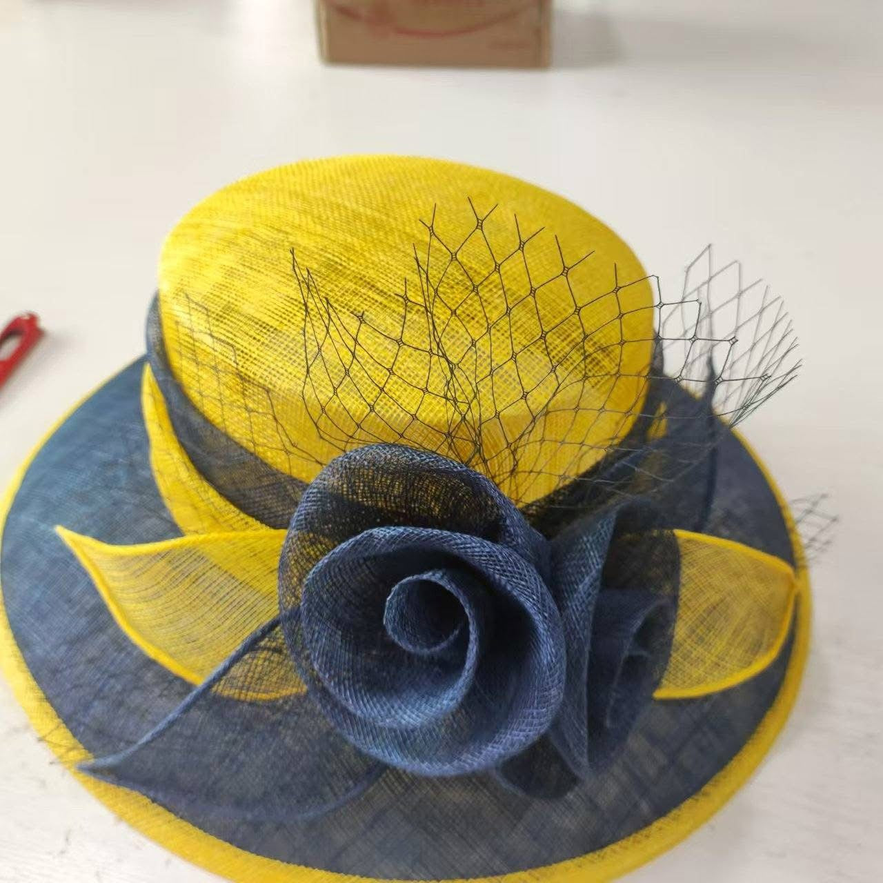 Yellow/Navy Blue medium brim with twirls