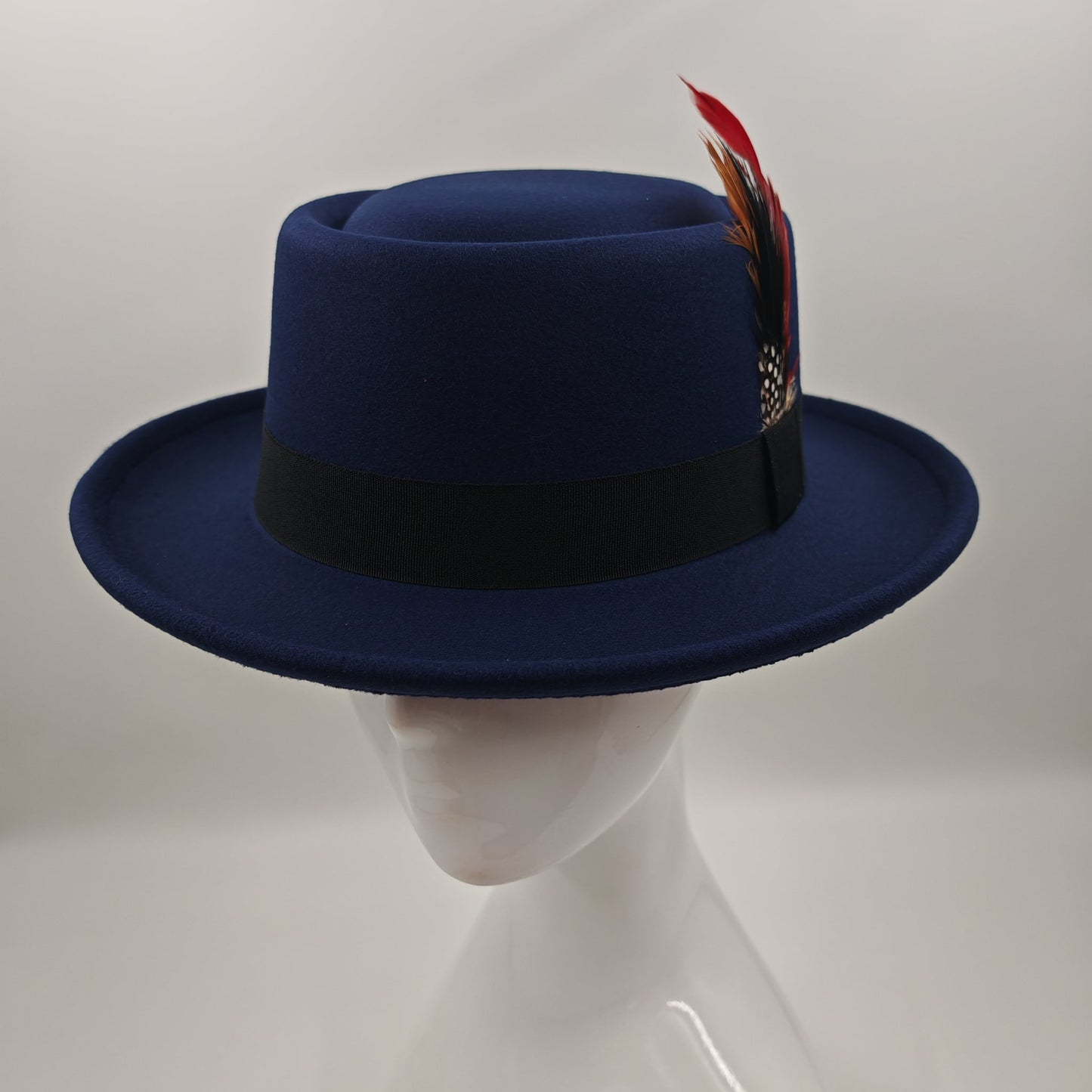 Navy pork pie hat with hunter Feather