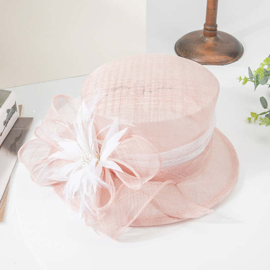 Baby pink sinamay hat with white trim