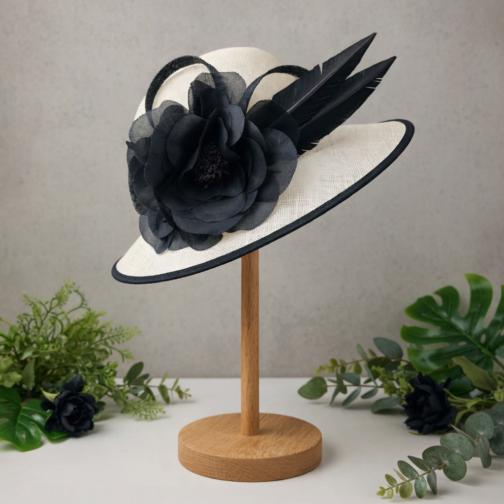 White sinamay piece with black trim