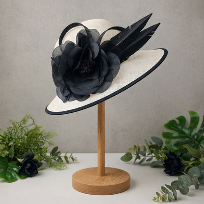 White sinamay piece with black trim
