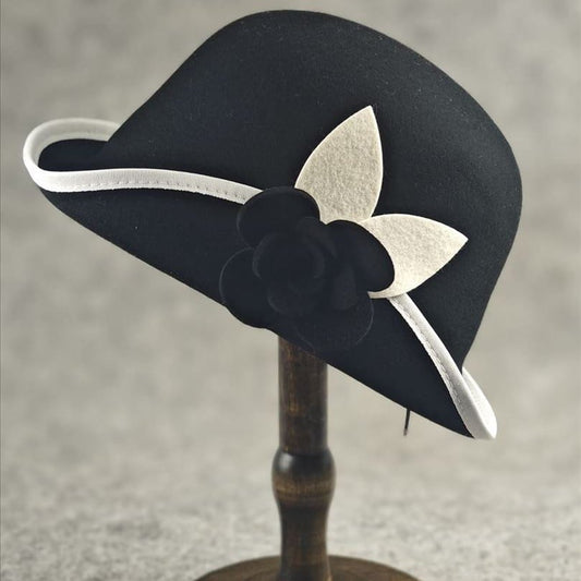 Black wool vintage medium brim with white trim