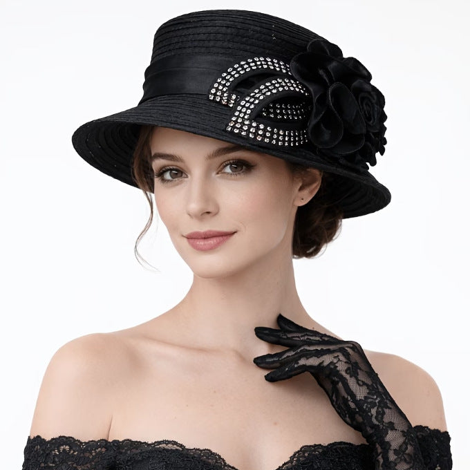 Black sinamay piece with bling trim