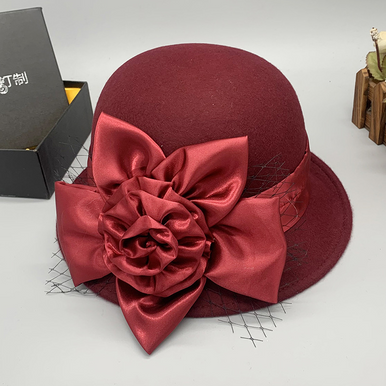 Maroon wool hat with flower embelishment