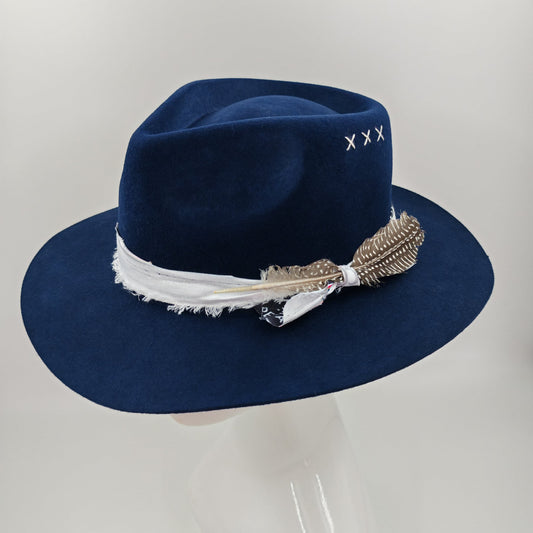 Stunning Navy wool fedora wit white trim and feather